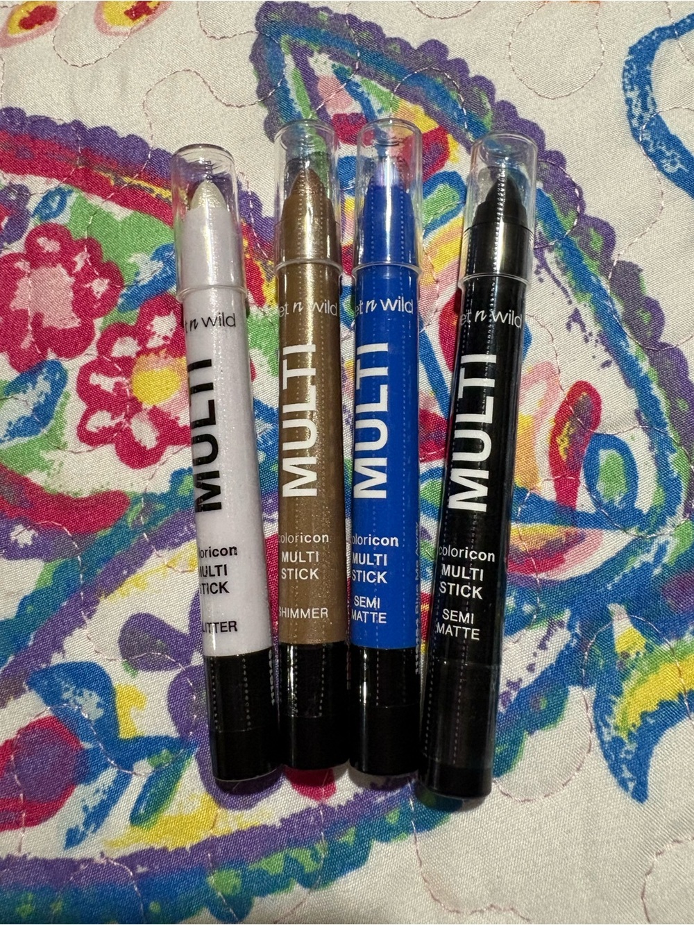 wet n wild Color Icon Multi Sticks — White, Gold, Blue, Black